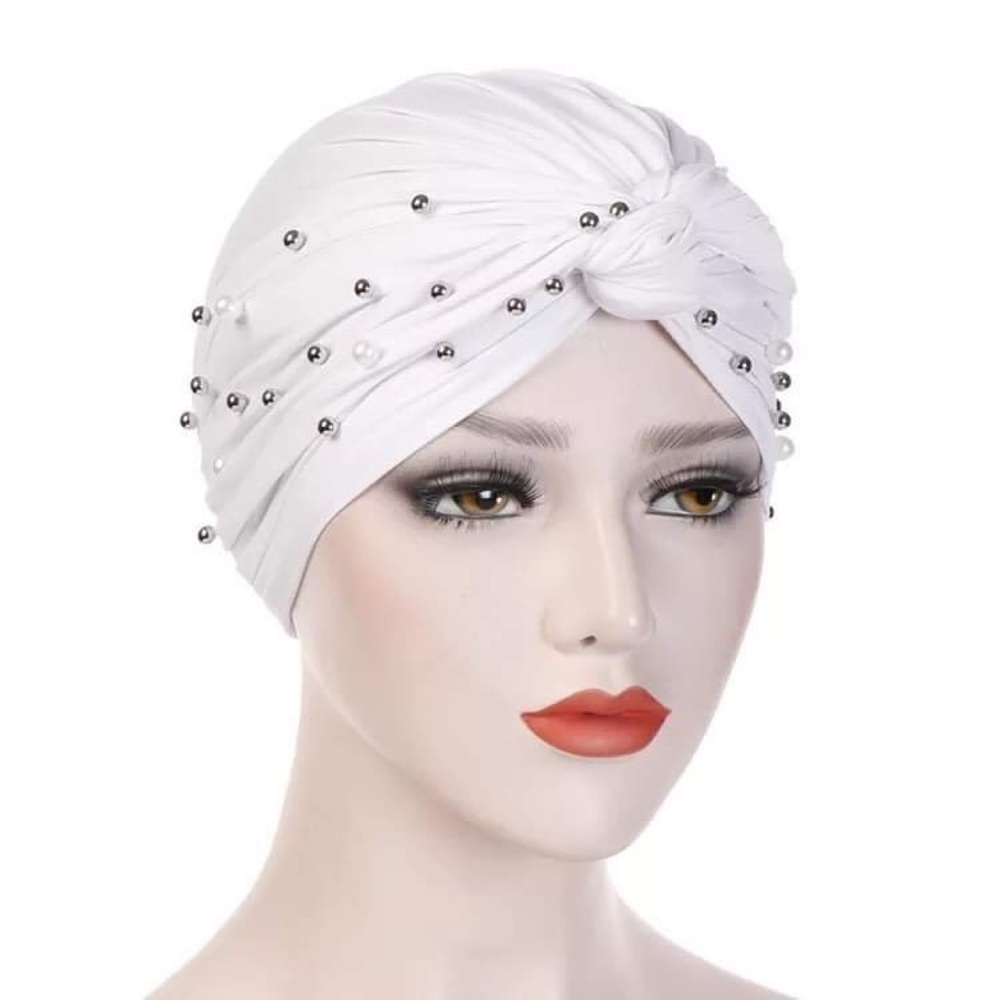 Woman’s white turban